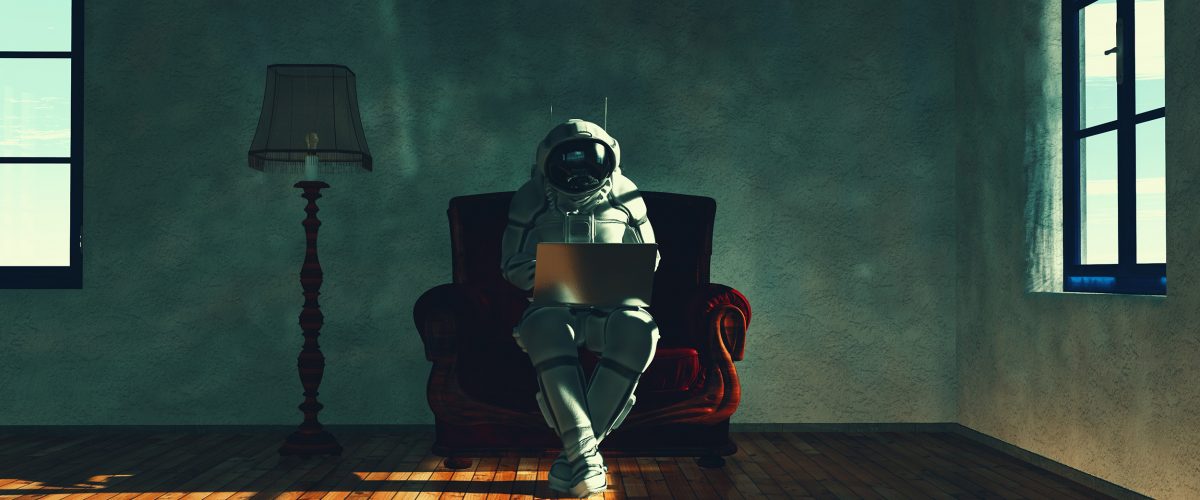 Astronaut sits on armchair and working on laptop in apartment . This is a 3d render illustration .
